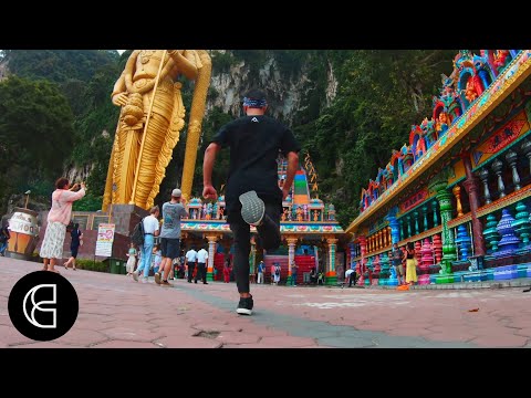 Freerunning across the rainbow steps of Batu Caves, Malaysia | GoPro Send It Worldwide image